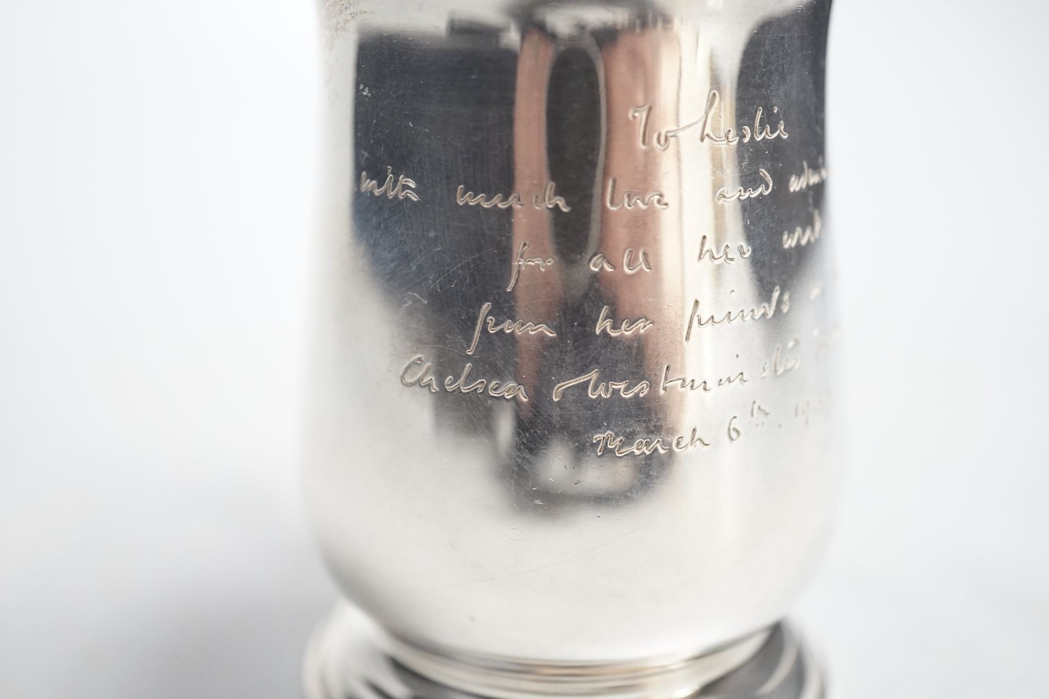 A Victorian silver christening mug, London, 1936, with engraved inscription, 89mm, 141 grams.